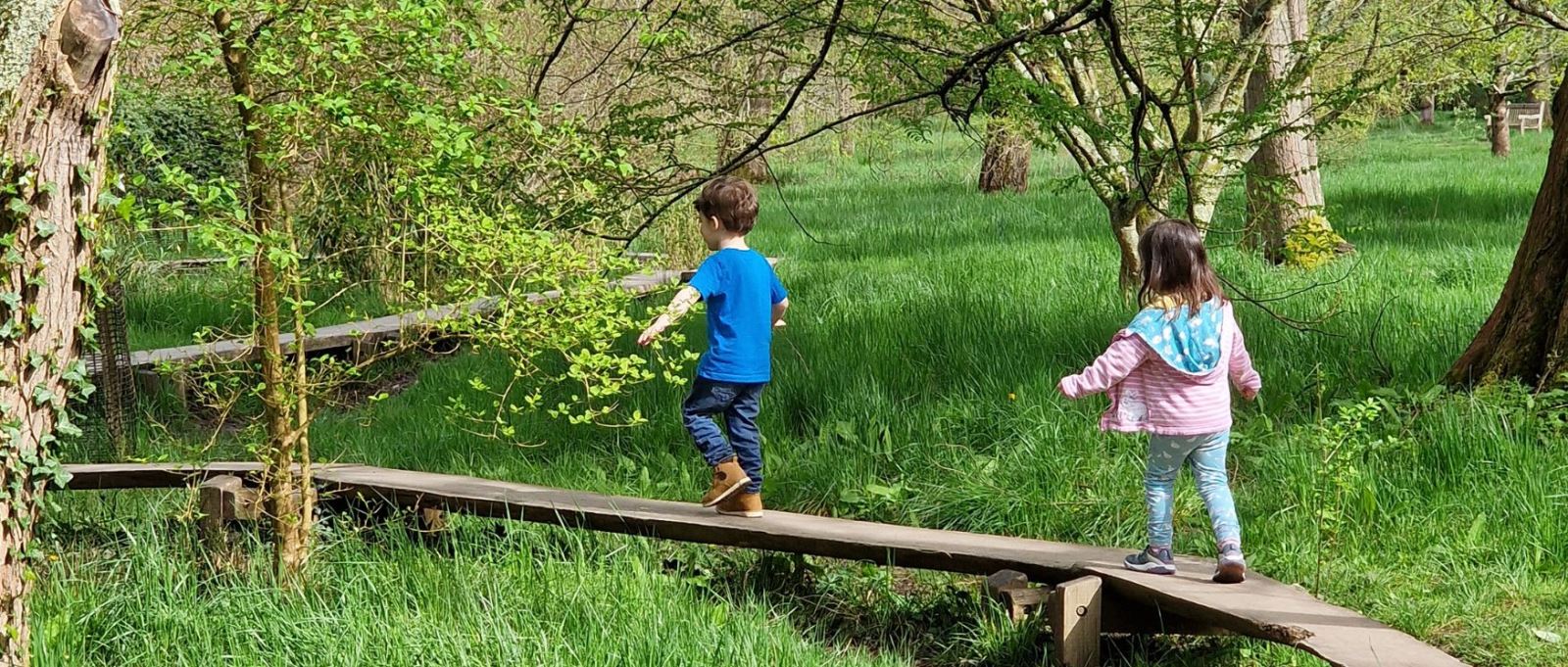 Two children playing at Sir Harold Hillier Gardens